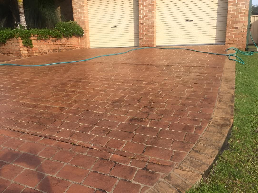 Brick Driveway With a Hose — Hastings Services in Port Macquarie, NSW