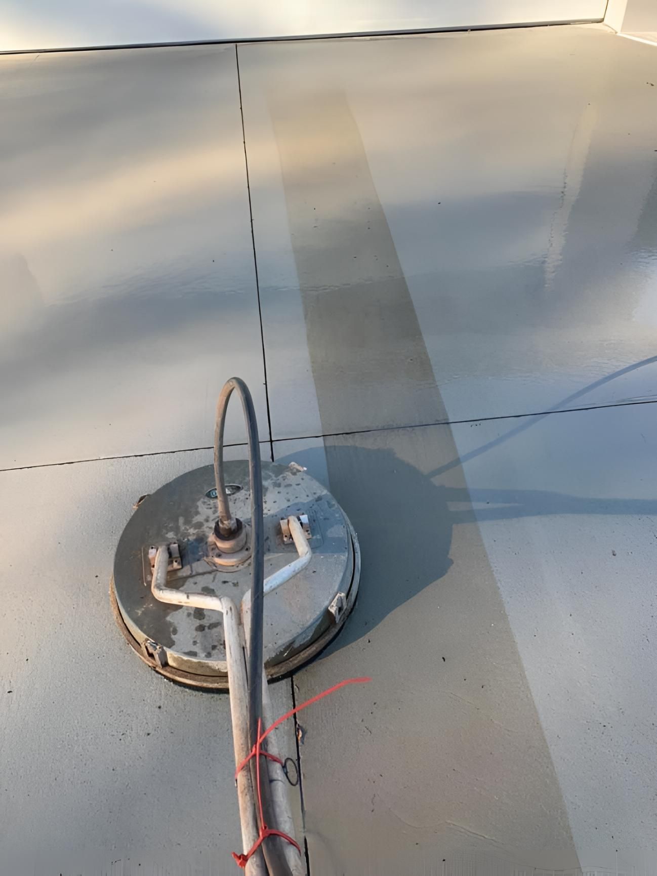 Floor Getting Clean by Machine Using Water — Hastings Services in Taree, NSW