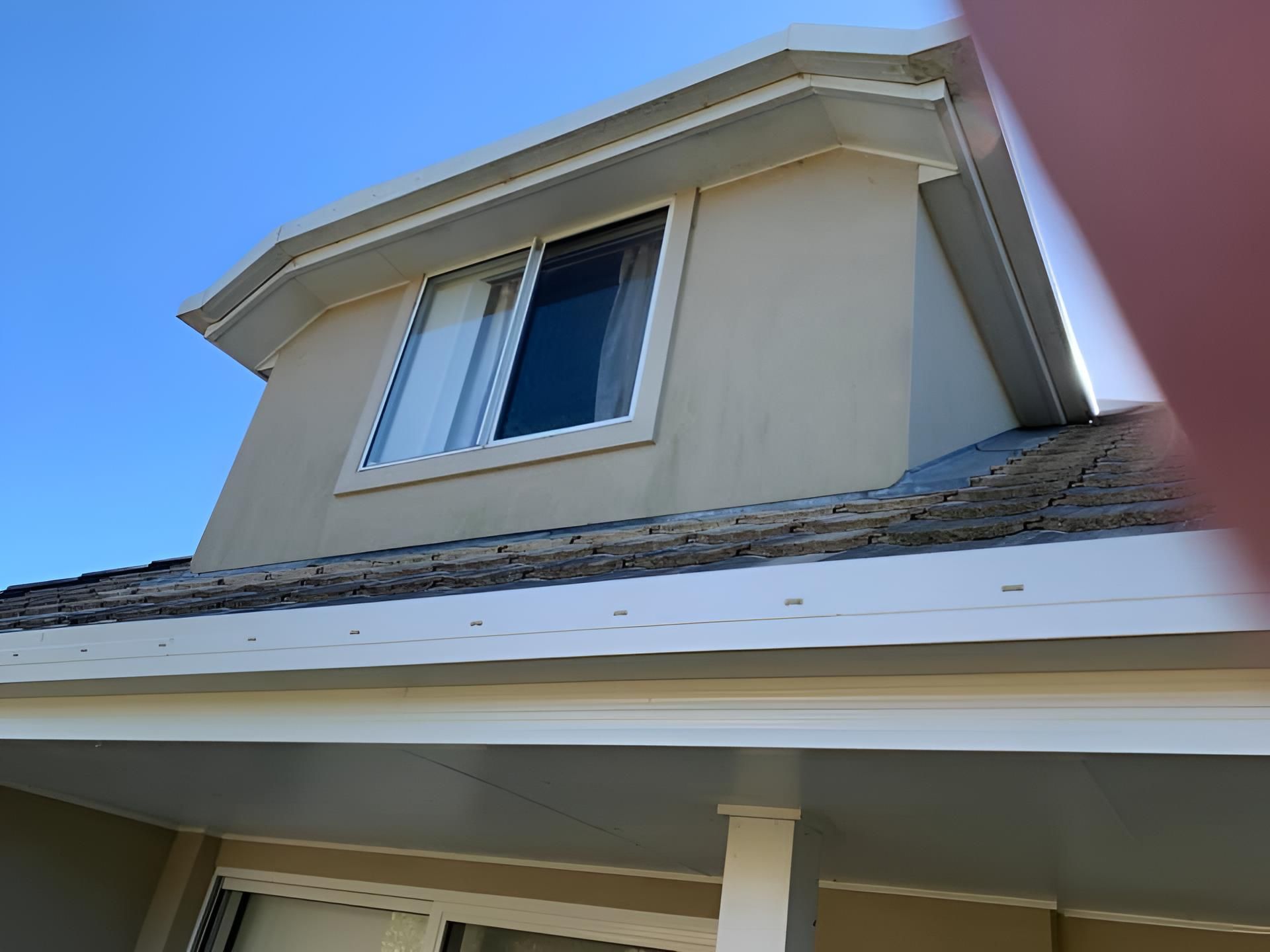 Roof of a House With a Clean Window — Hastings Services in Lake Cathie, NSW