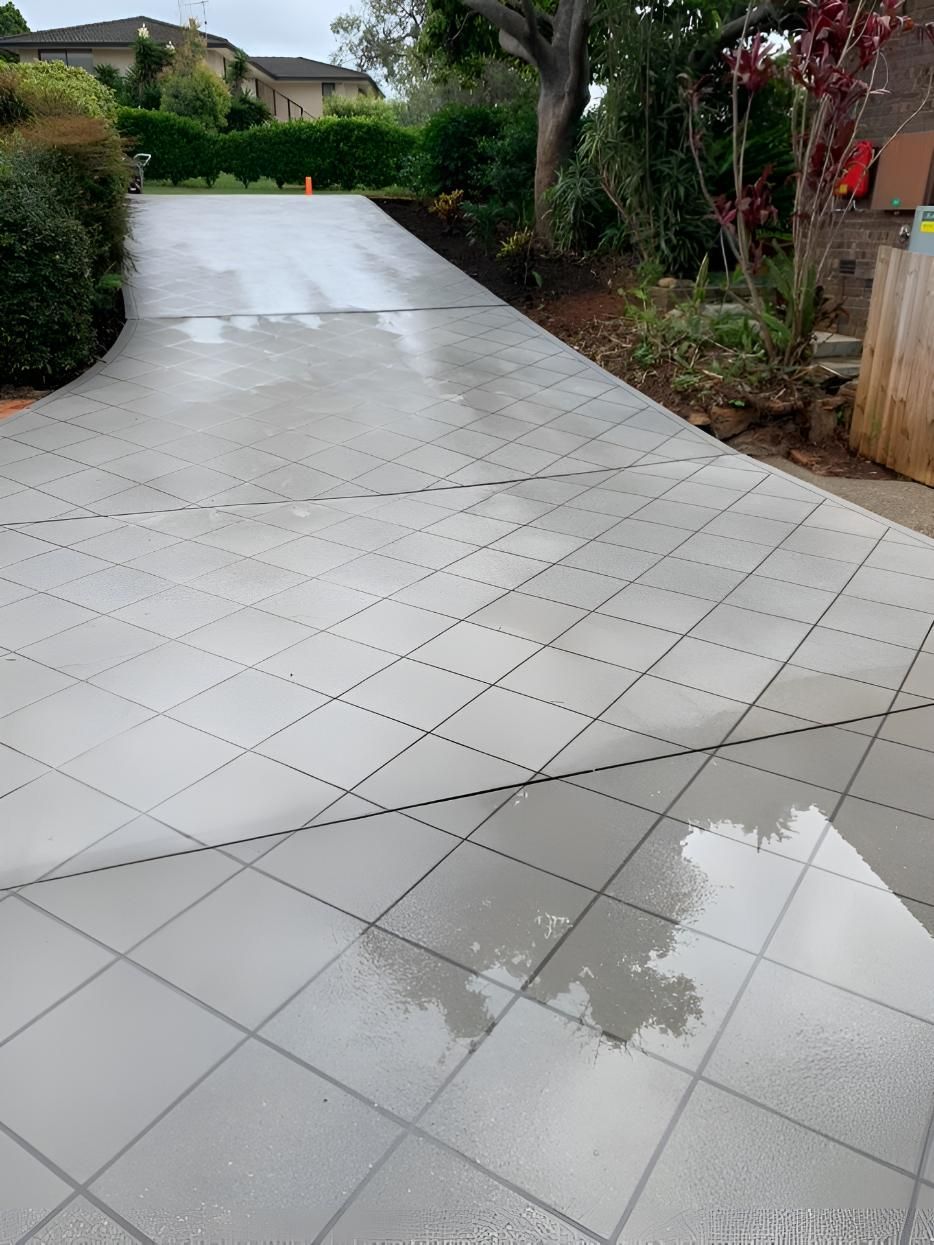 Driveway With a Reflection of a Tree in the Water — Hastings Services in Bonny Hills, NSW