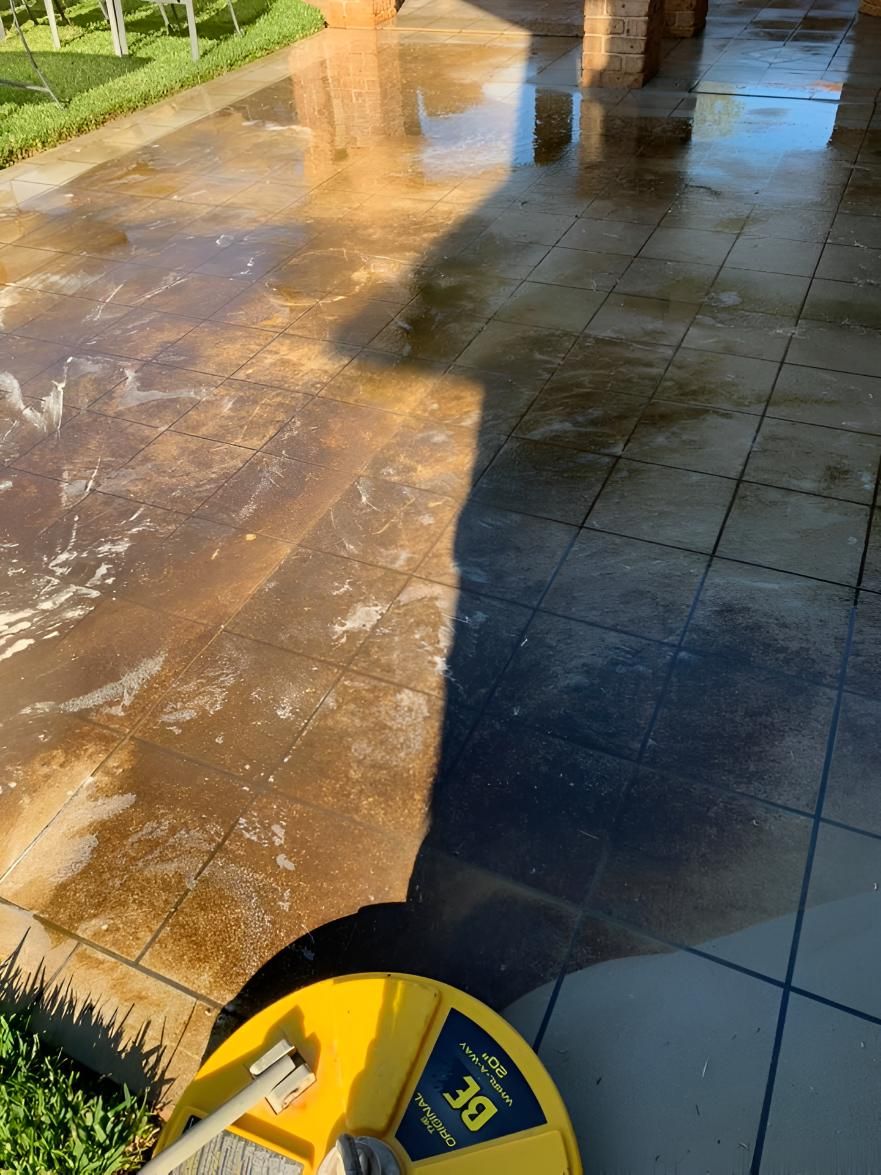Cleaning a Tiled Floor With a Yellow Machine — Hastings Services in Lake Cathie, NSW
