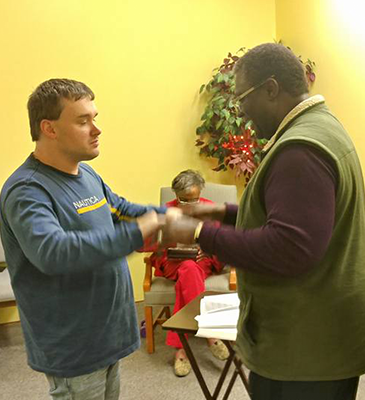 two men dancing in senior day care