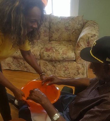 caregiver assisting her patient