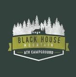 Black House Mountain ATV Campground logo with pine trees and a cabin on a dark green background