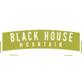 Black House Mountain logo with white text on a green and white background