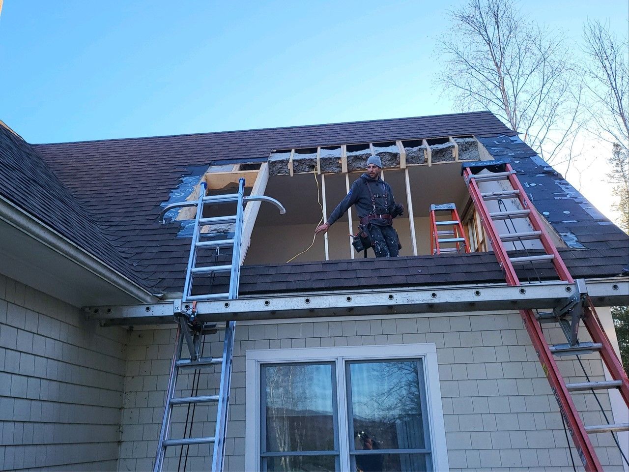Juggernaut Construction's roofing experts repair the roof of a Vermont home