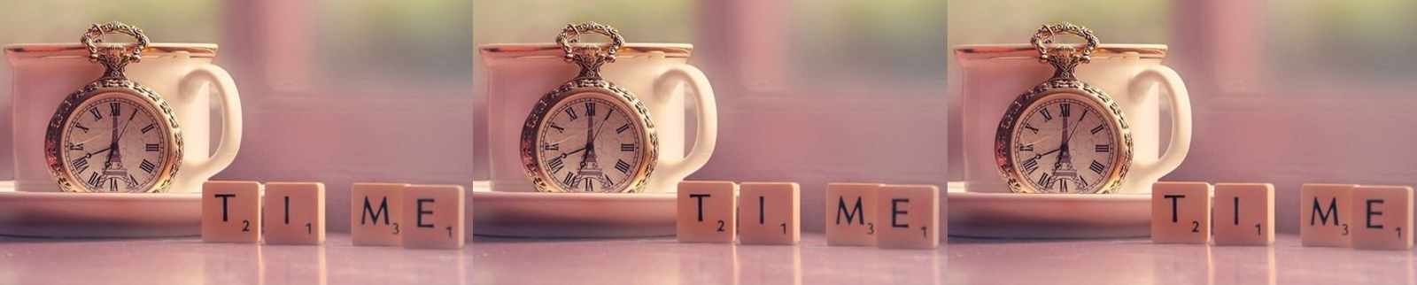 Drie zakhorloges in kopjes met daarop het woord 