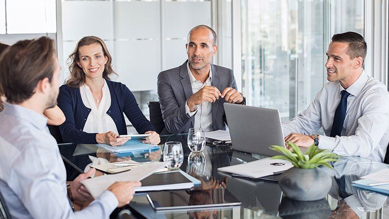 People talking around a table