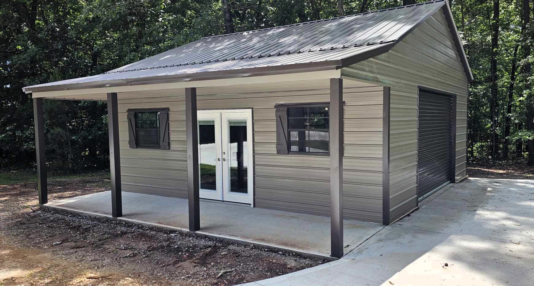 A small house with a porch and a garage door