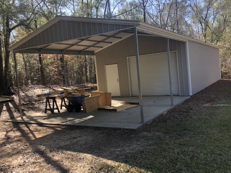 A garage with a covered area underneath it