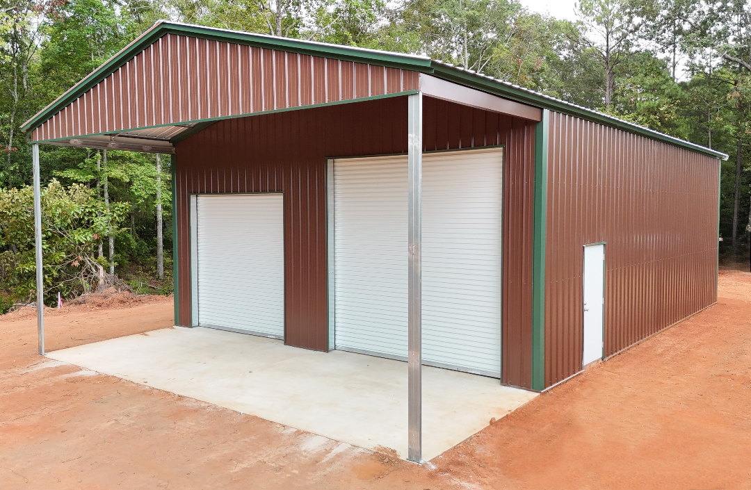 Brown metal garage with white doors and a green-trimmed roof; on a concrete pad outdoors.