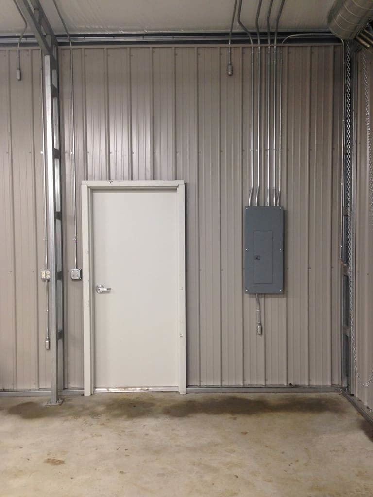 There is a door in the middle of the room.