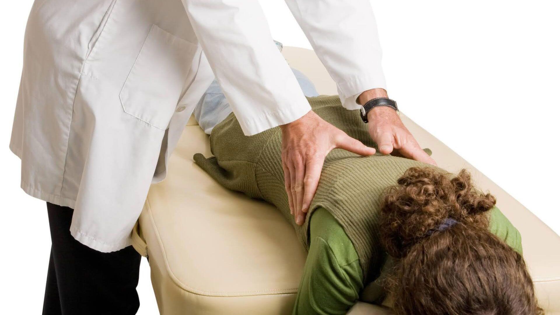 Chiropractor Checking a Patient — Charlotte, NC — Accident & Injury Center Chiropractor Checking a Patient — Charlotte, NC — Accident & Injury Center