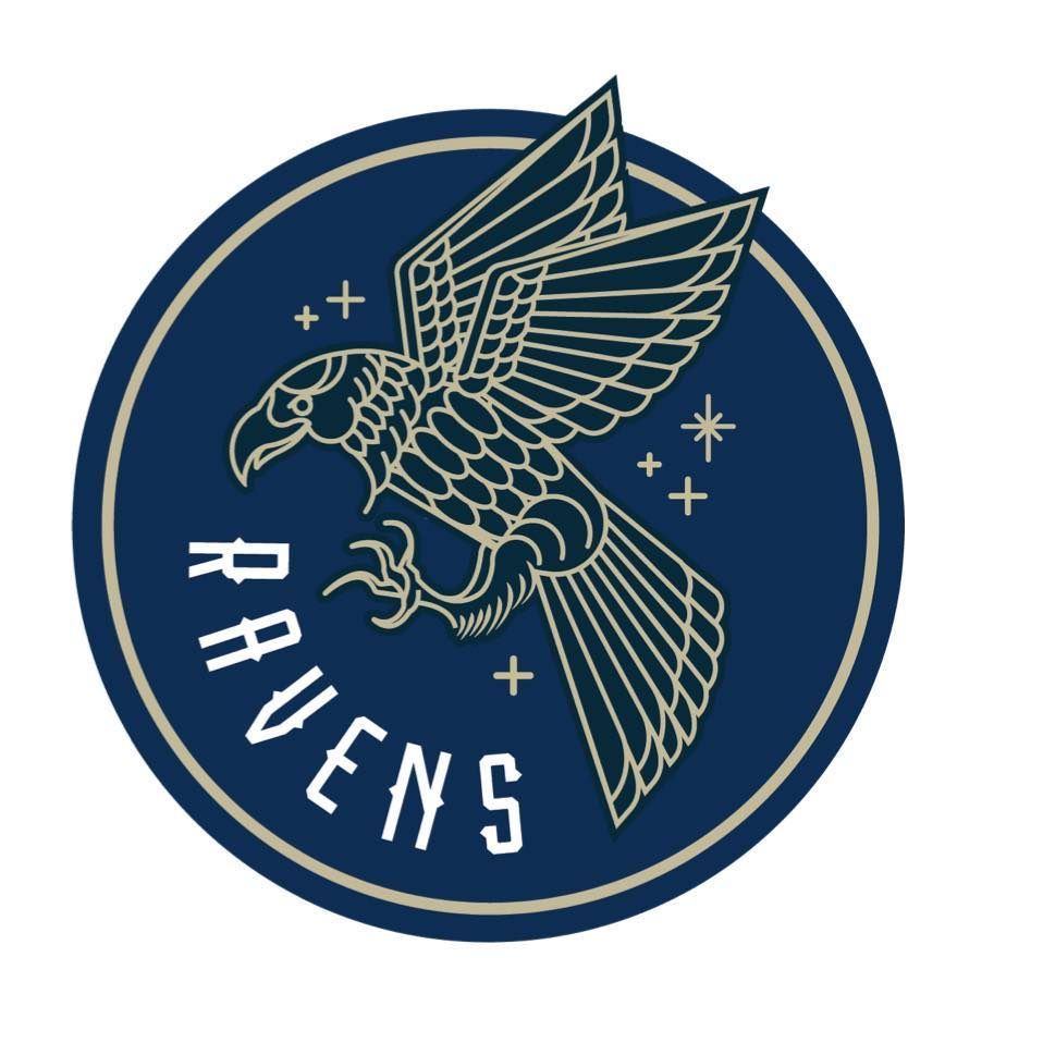 A circular navy blue logo featuring a gold-outlined raven in flight, surrounded by stars with the word "RAVENS" below.