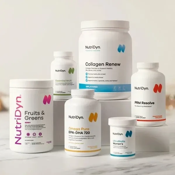 Assorted NutriDyn supplement bottles in white containers with colorful labels on a light background