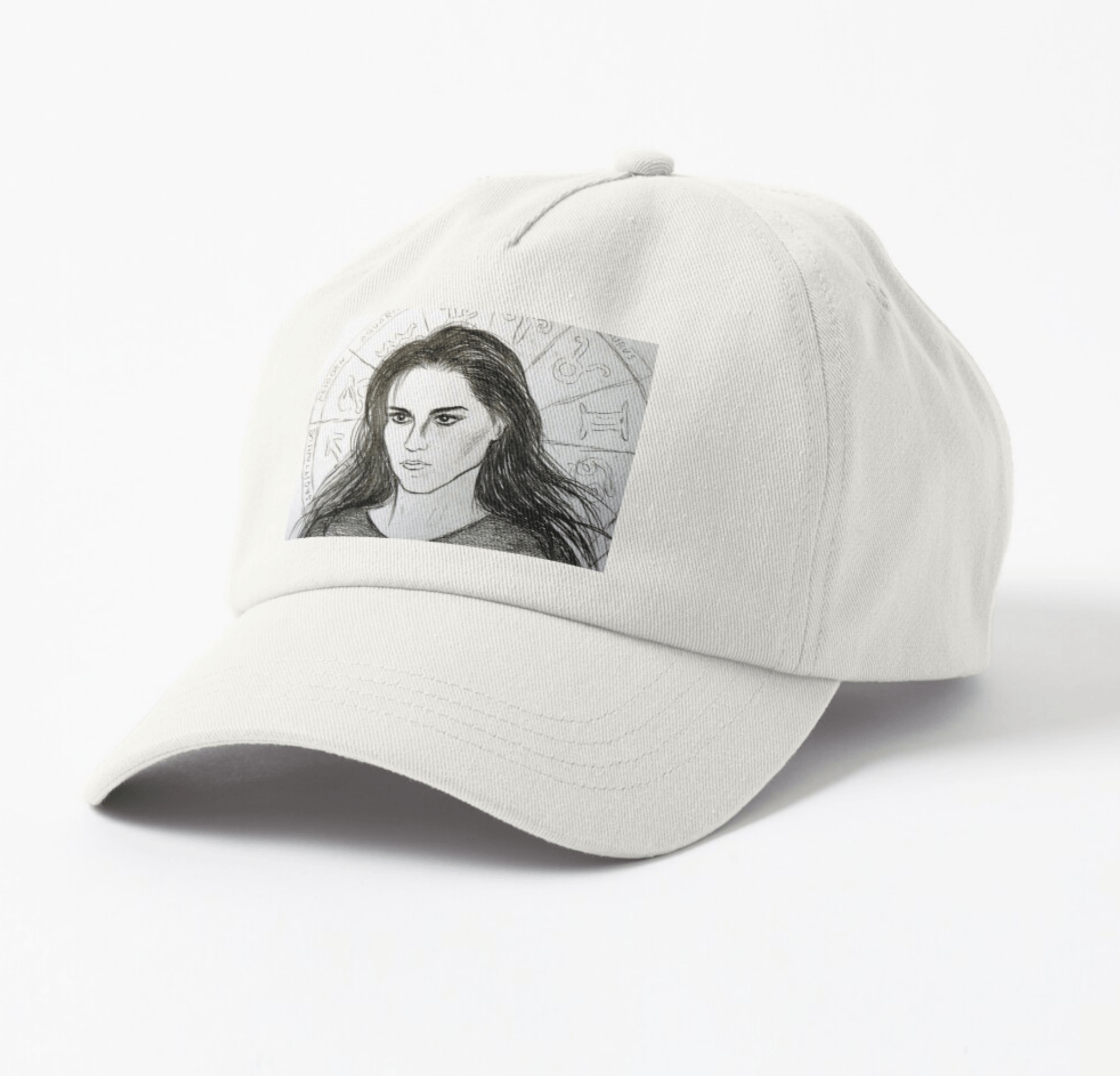 A light-colored baseball cap with a black and white portrait of a woman on the front.