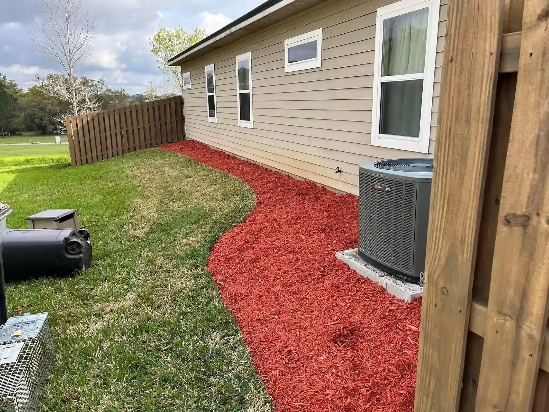 Red mulch in a garden bed