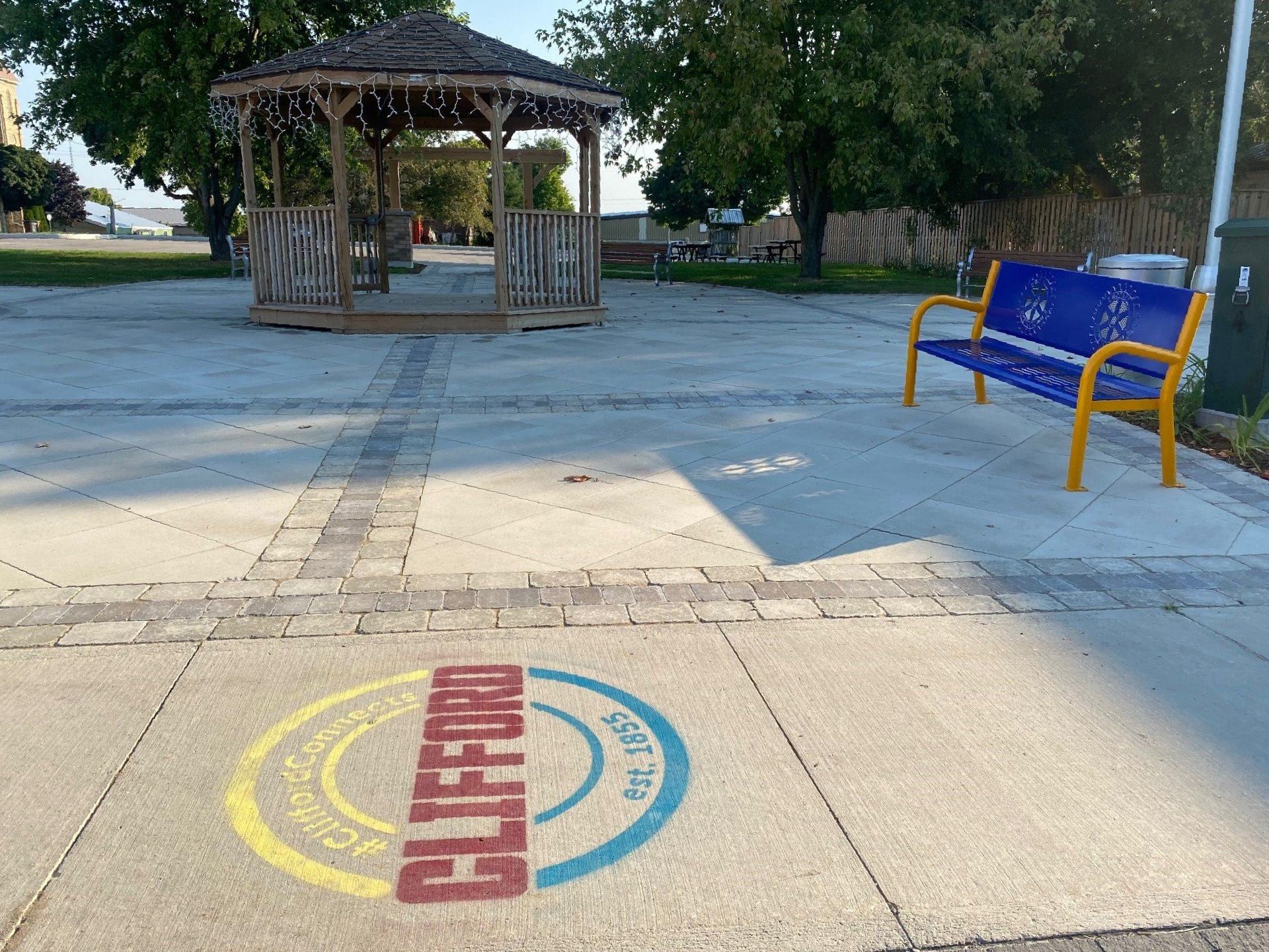 Clifford Connects logo on concrete walkway at Celebration Square