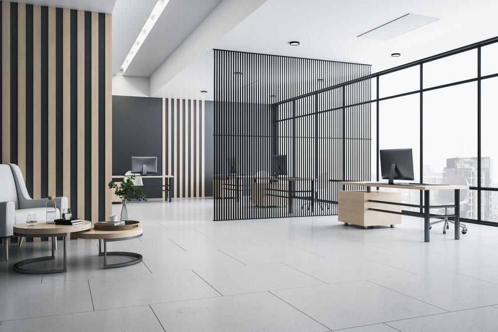 A Modern Office With a Lot of Windows and a Chair — Headlands Glass in Ballina, NSW