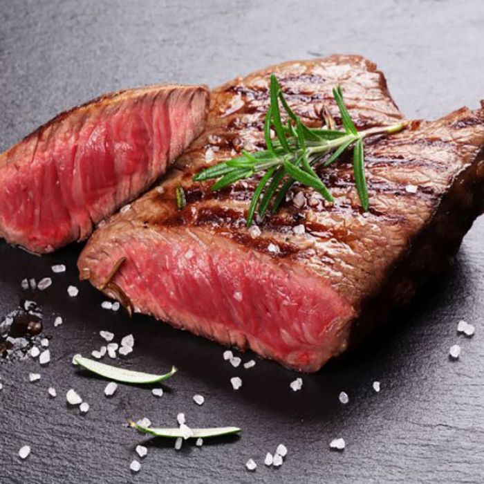 A steak with a slice taken out of it