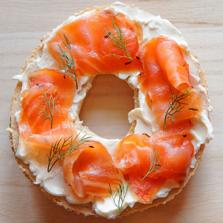 A bagel with smoked salmon and cream cheese on it