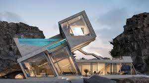 A modern house with a swimming pool in the middle of a mountain.