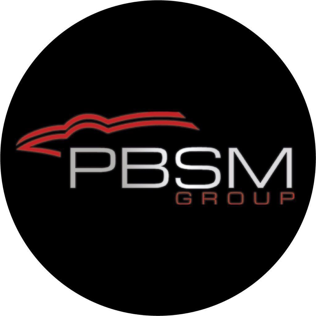 The PBSM Group logo: stylized red vehicle outline over white text on a circular black background.