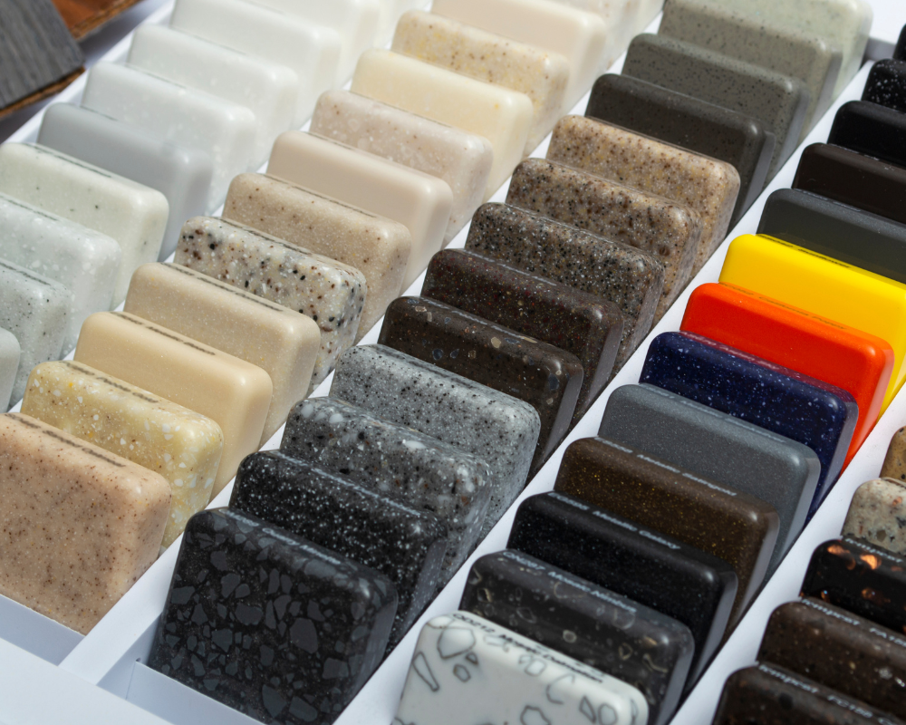 A display of different colored granite slabs in a row