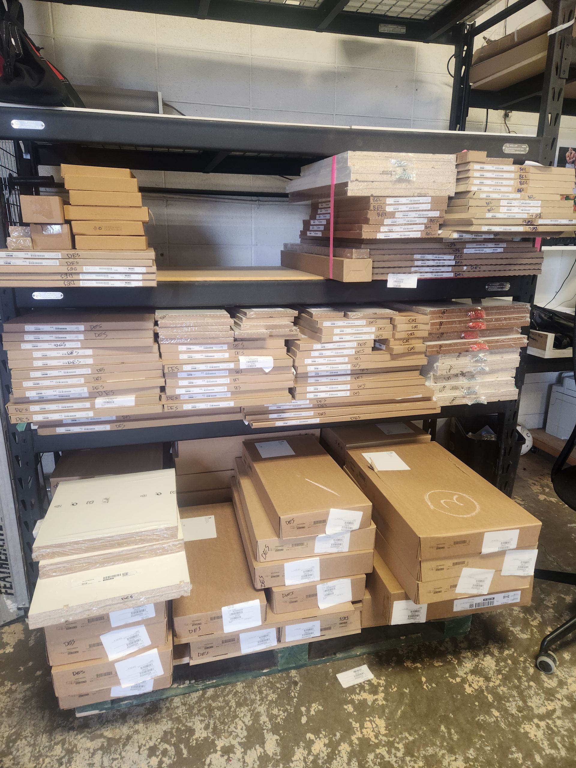 A warehouse filled with lots of boxes and shelves