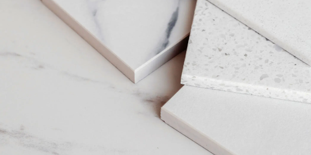 A close up of a piece of marble on a counter top.