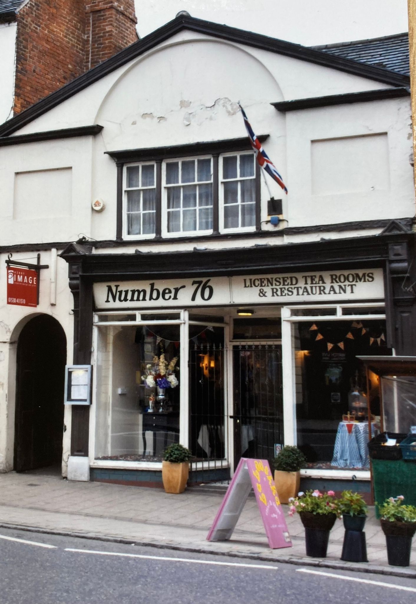 A building with a sign that says number 70
