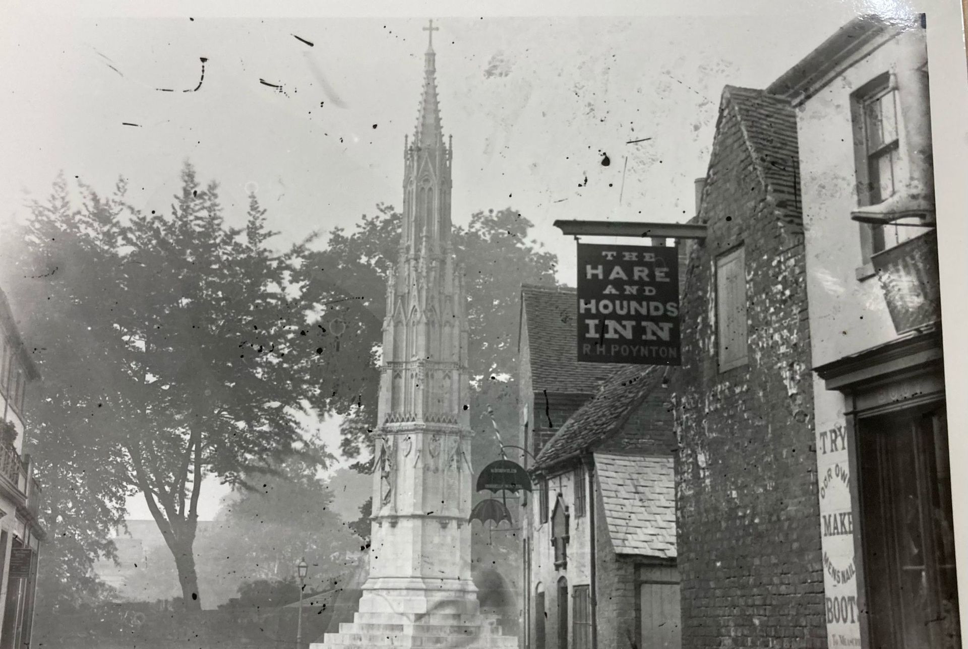 A black and white photo of the hark and hounds inn