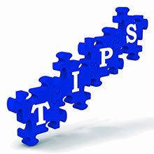 The word tips is made of blue puzzle pieces on a white background in Columbus