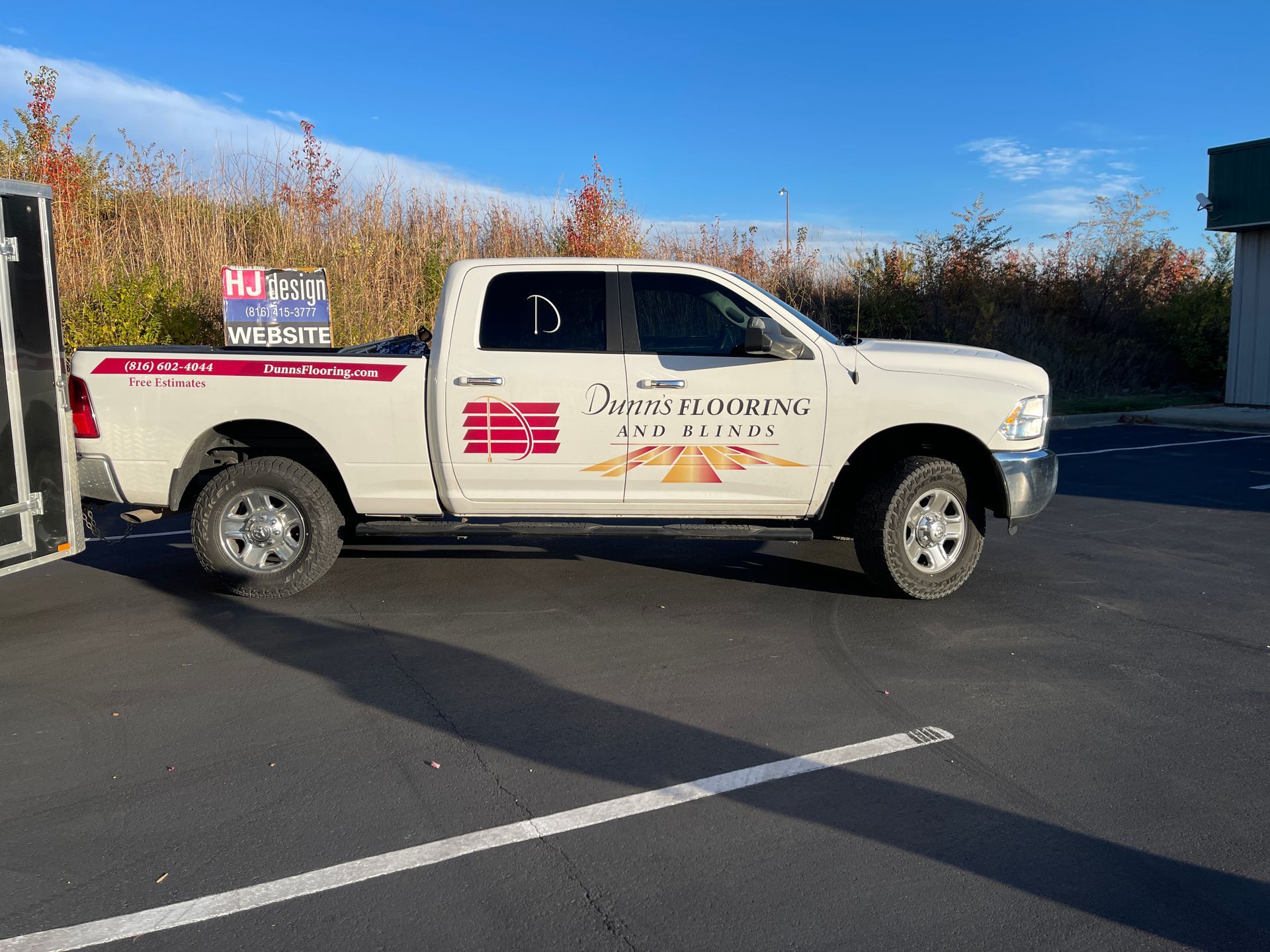 Car wrap design by HJ Design, Kansas City, Missouri, with striking visual elements.