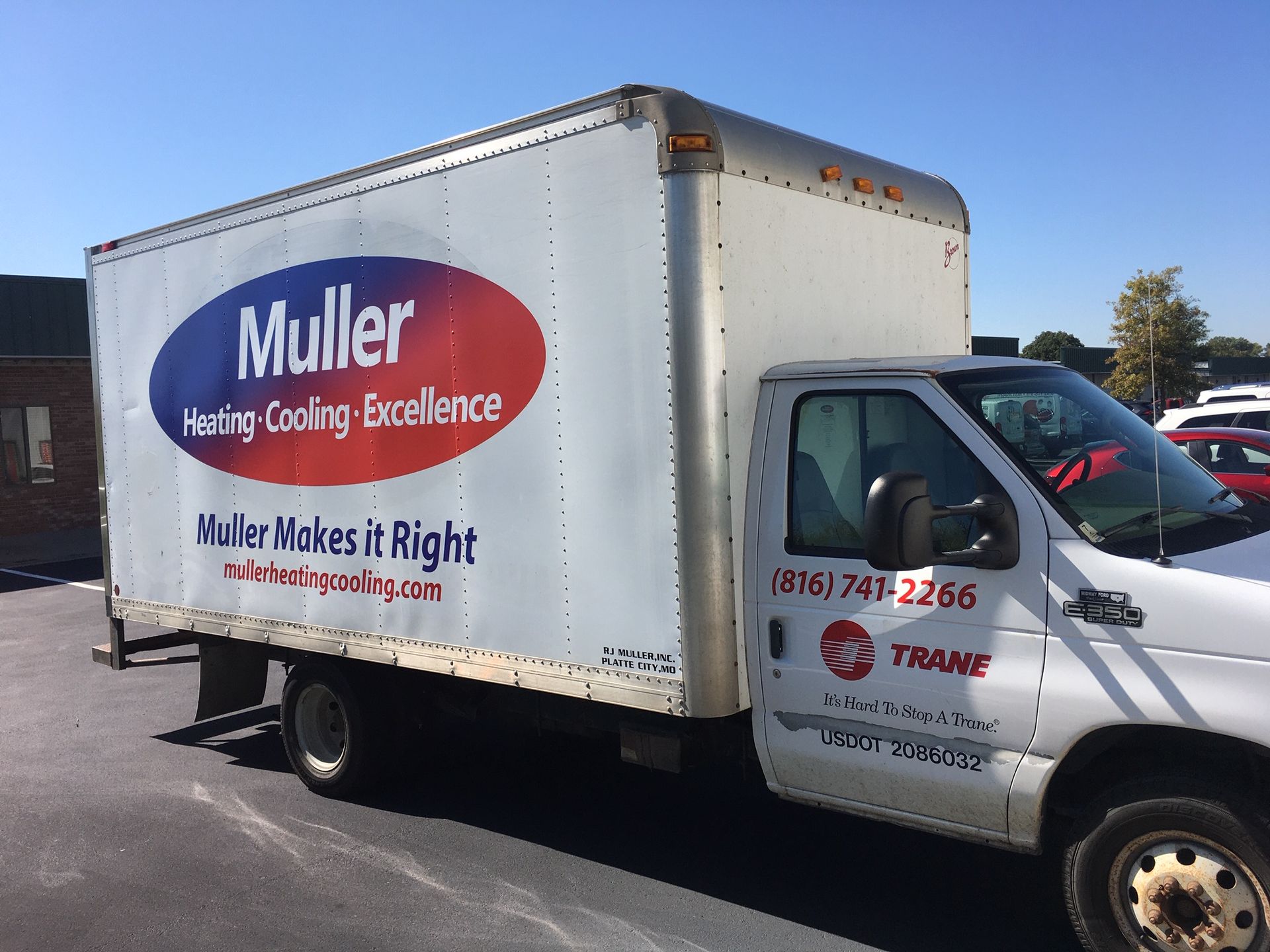 HJ Design vehicle wrap showcasing a custom business logo in Kansas City, Missouri