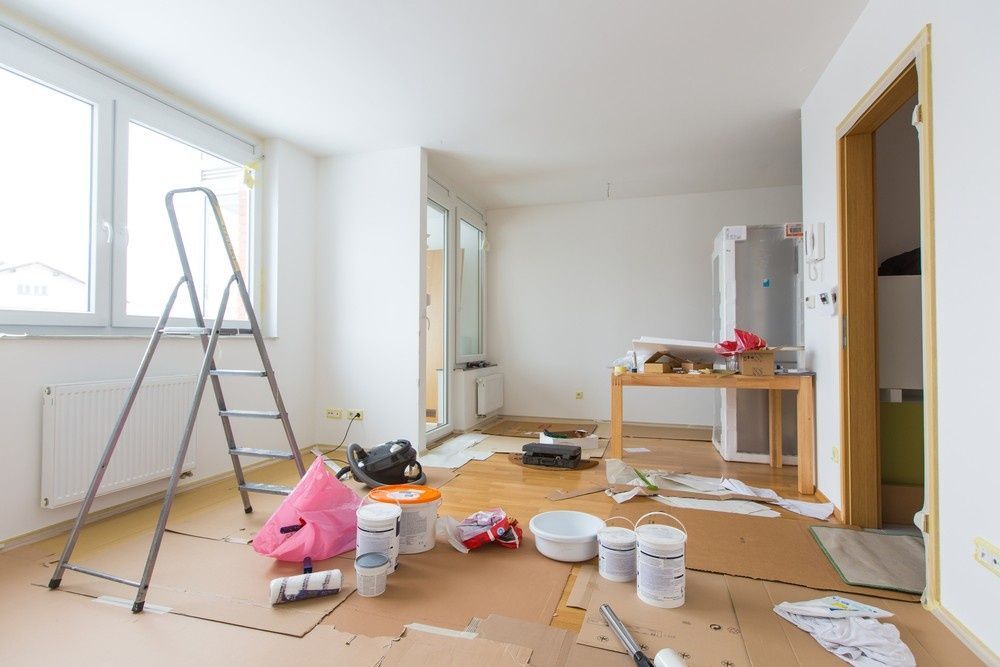 Room Being Renovated with Ladder, Paint Cans, and Tools — A1 Painting NQ in Mareeba, QLD