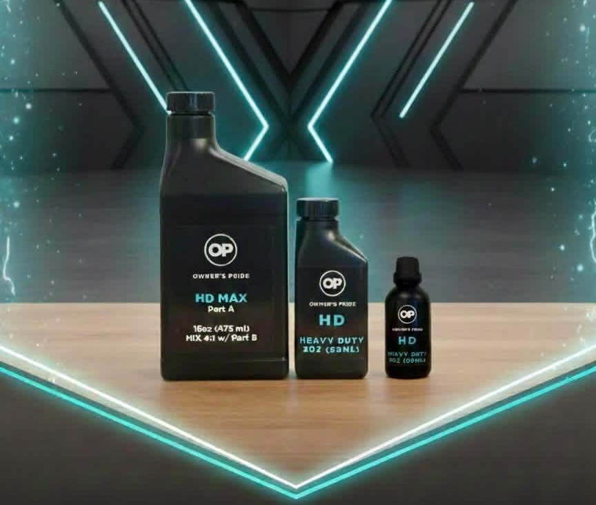 Three black HD Max bottles on a neon-lit geometric platform, with a futuristic dark background.