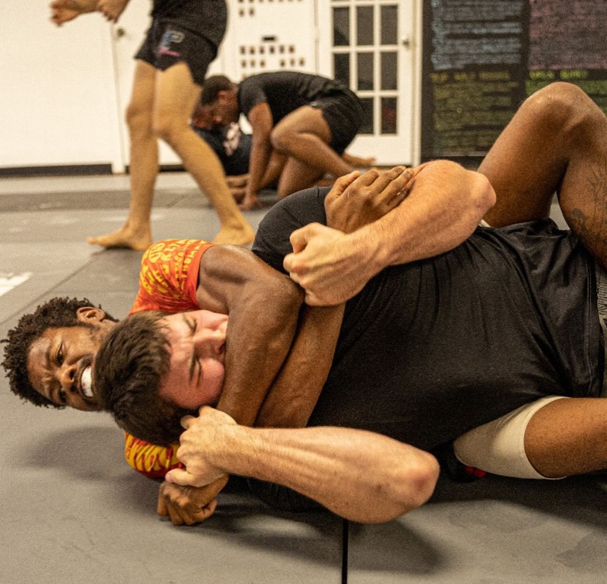 Students drilling no-gi Jiu-Jitsu at 10th Planet Jiu-Jitsu Miami in Miramar, FL to build strength and focus