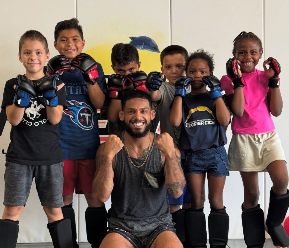 Kids practicing Youth Jiu-Jitsu drills at 10th Planet Jiu-Jitsu Miami in Miramar, FL to build focus and respect.