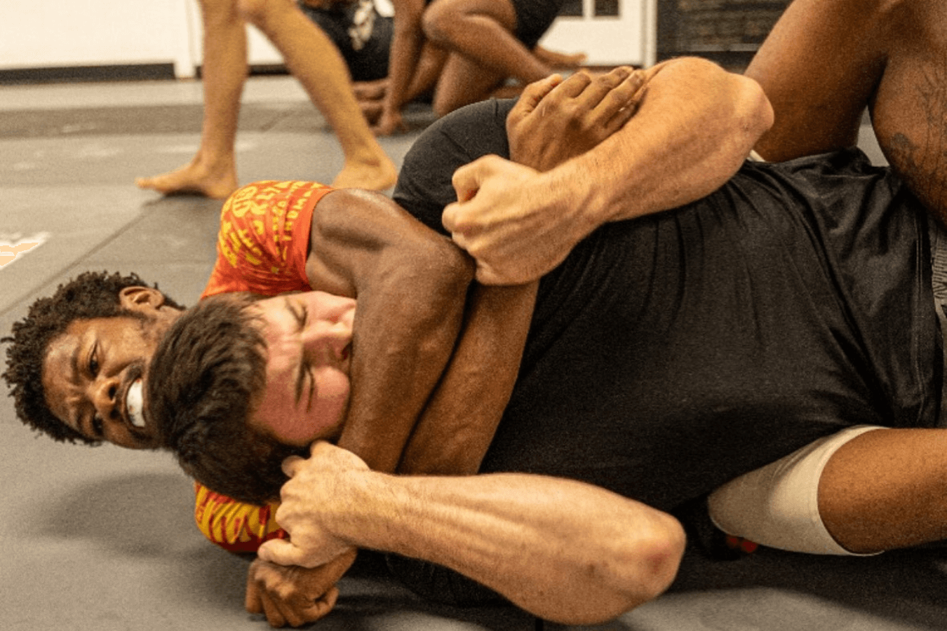 No-Gi students drilling technique at 10th Planet Jiu-Jitsu Miami in Miramar, FL, building focus and confidence.