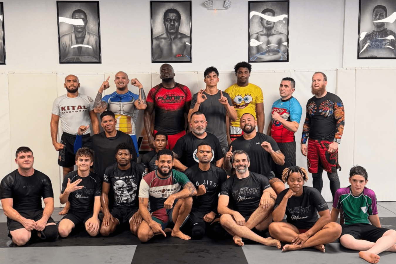 Adults practice pad combinations at 10th Planet Jiu-Jitsu Miami in Miramar, FL, building confidence and fitness.