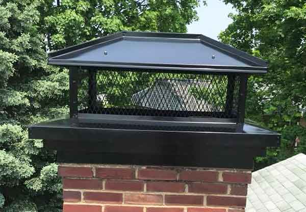 custom chimney cap installed on brick chimney in augusta georgia