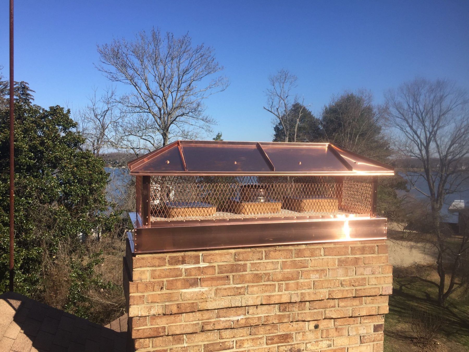 multi flue chimney cap installation in augusta