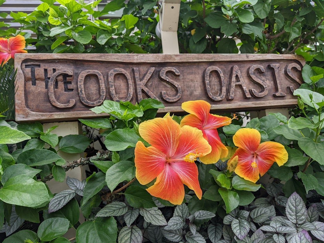 A wooden sign reading 