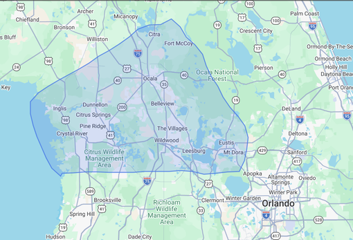 Weather map of central Florida with a blue radar coverage area around Orlando and Tampa.
