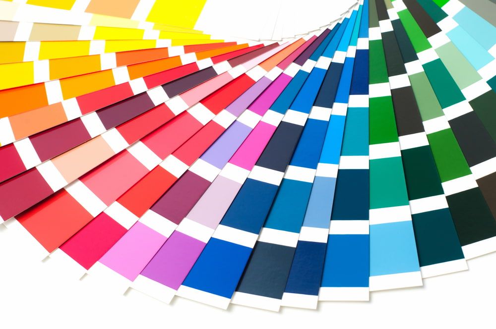 Colour Swatches Arranged in a Fan, Featuring a Spectrum of Vibrant Colours — KNG Roofing And Construction in Palmerston, NT