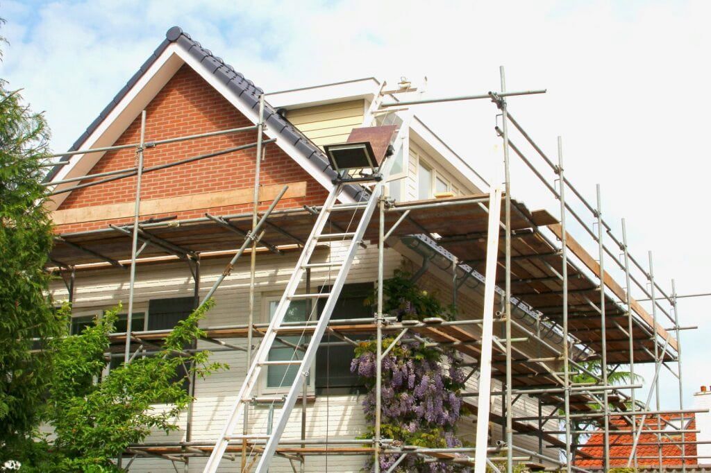 House Under Construction; Scaffolding Surrounds the Building — KNG Roofing And Construction in Tennant Creek, NT