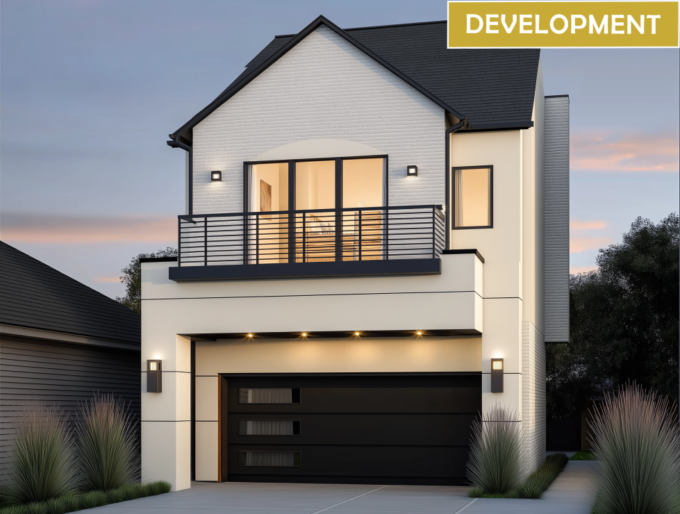 Modern two-story house under construction with black garage door and balcony. 
