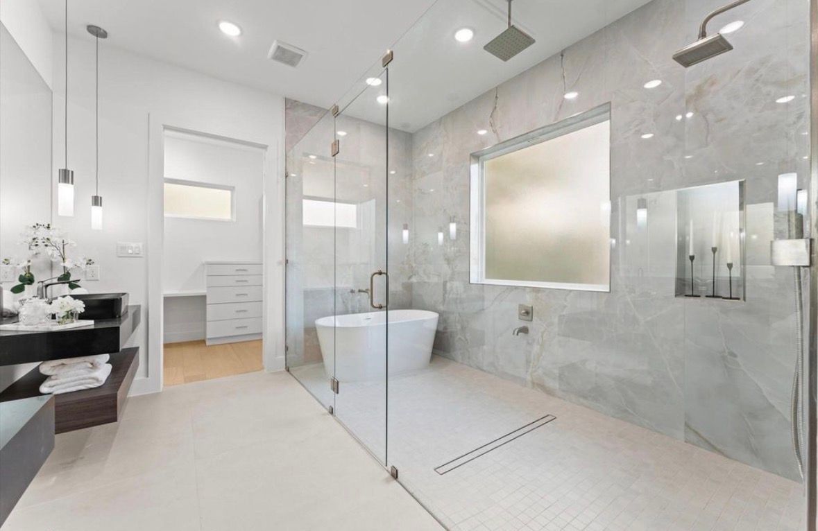 Double vanity bathroom with vessel sinks and large mirror modern design