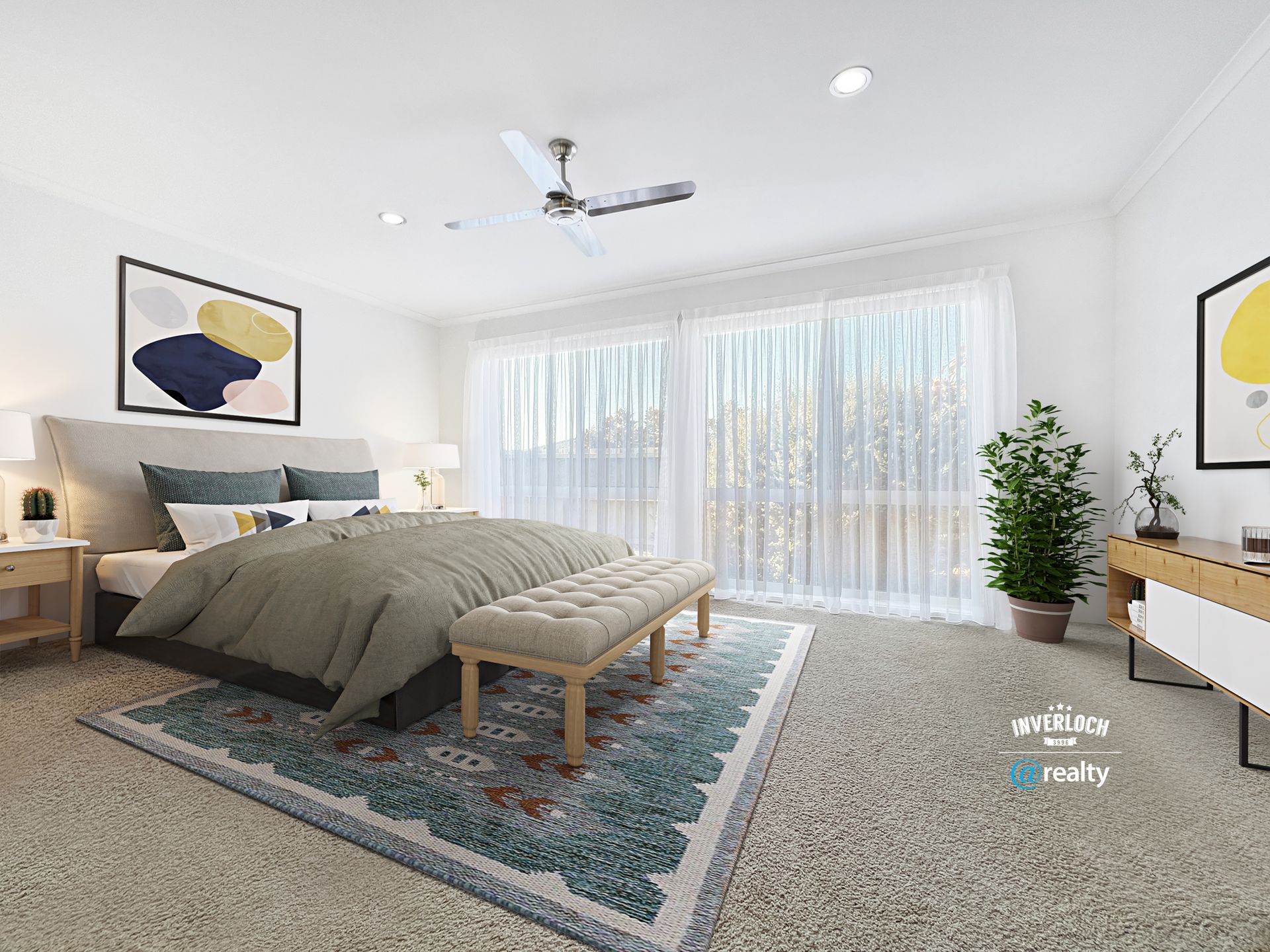 A bedroom with a large bed , a bench , a rug and a ceiling fan.